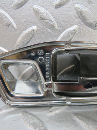 W123 chrome frame door opener front left used OEM