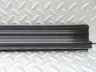 W123 front left door sill trim black used OEM