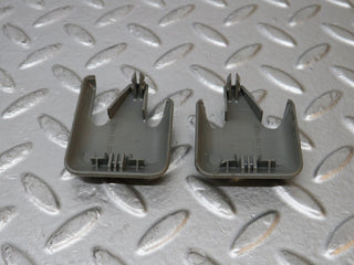W124 Wagon front seat rail trim cover pair used OEM