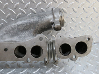 W140 exhaust manifold left used OEM