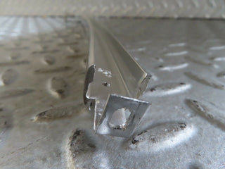 W123 rear right door chrome window channel used OEM