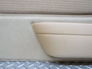 W123 front left door card beige used OEM