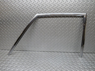 W109 front left door chrome window frame used OEM