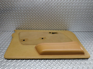W123 front left door card beige used OEM
