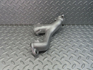 W111 exhaust manifold used OEM