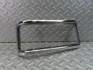 W115 tail light chrome frame left side used OEM