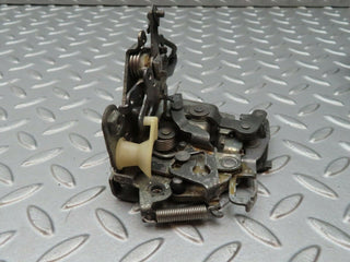 W123 front left door lock mechanism used OEM