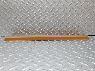W124 rear left door sill trim palomino used OEM