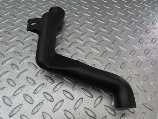 C140 engine bay water drain left used OEM