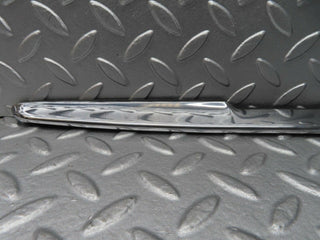 R107 SLC trunk chrome handle moulding used OEM