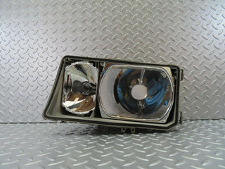 10506 Mercedes-Benz W201 190E Headlight Bosch Left Side 0301067725