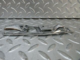 R107 SLC door handle chrome surround left side used OEM