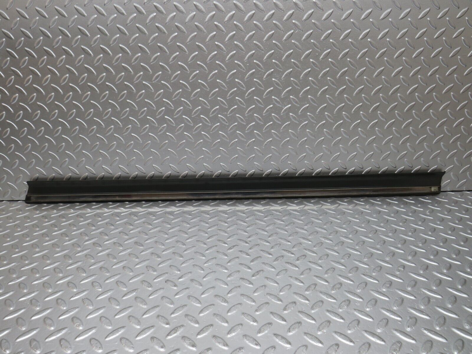 30793 Mercedes-Benz W201 190E 2.0L Front Left Door Lower Moulding Trim