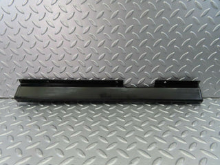 W123 cable channel cover front left used OEM