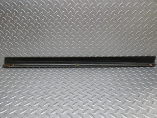 W123 front left door lower moulding trim used OEM