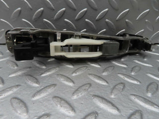 W124 rear left exterior door handle used OEM