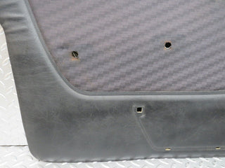 W123 front left door card black used OEM