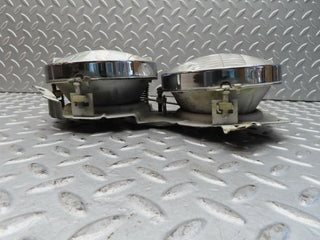 W111 headlight left/right used OEM