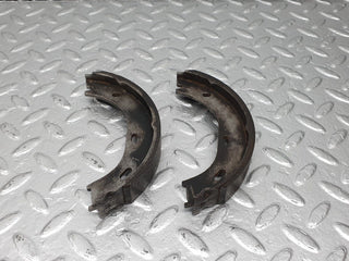 W123 rear brake shoes set right side used OEM