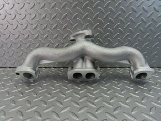 W115 exhaust manifold used OEM