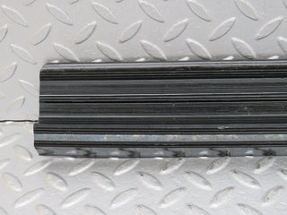 W123 rear right door sill trim black used OEM