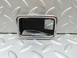 W123 chrome frame for door opener left used OEM