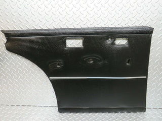W108 rear left door card black used OEM
