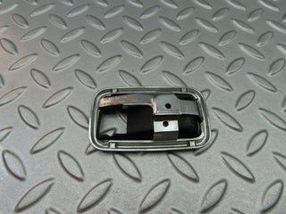 W123 chrome frame for door opener right used OEM