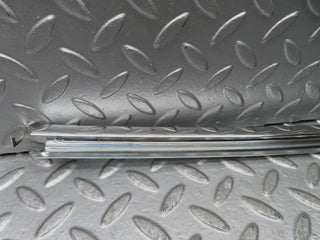 W123 rear right door chrome window channel used OEM