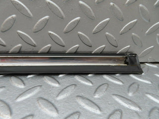 W123 front right door lower trim used OEM