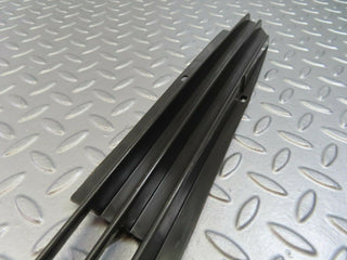 W115 front lower grill left used OEM
