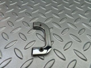 W123 left interior chrome door latch trim used OEM