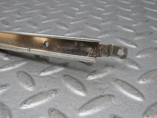 W108 rear left door window chrome channel used OEM