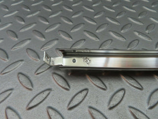 W123 rear right chrome window channel used OEM