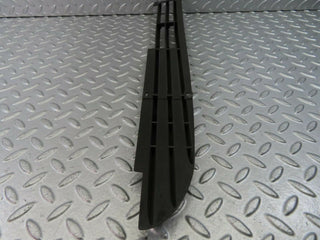 W115 front lower grill left used OEM