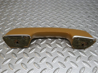 W123 interior door handle front right palomino used OEM
