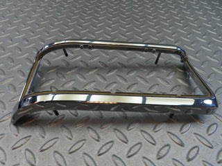 W115 tail light chrome frame left used OEM