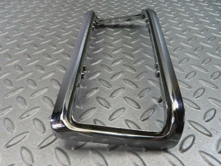 W115 tail light chrome frame left used OEM
