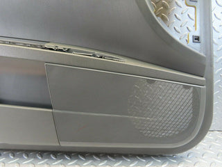W221 front left door card used OEM