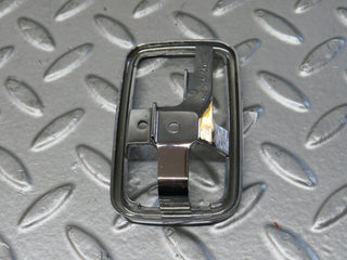 W123 chrome frame for door opener right used OEM