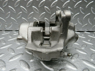 W124 Coupe rear left brake caliper used OEM