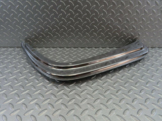 W108 front left upper bumper corner used OEM