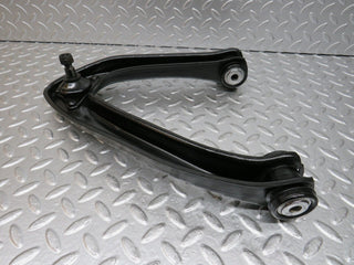 R107 SLC upper control arm front left used OEM