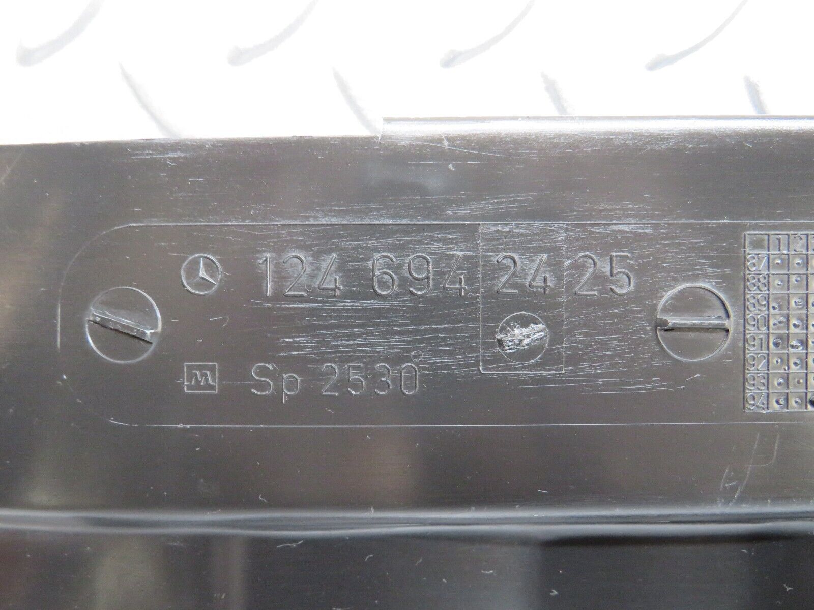 25888 Mercedes-Benz W124 280E Trunk Lock Trim Panel 1246942425