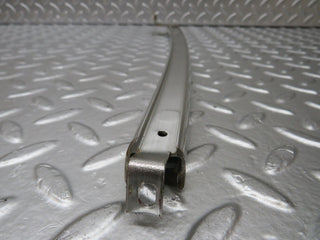 W123 rear left chrome window channel used OEM