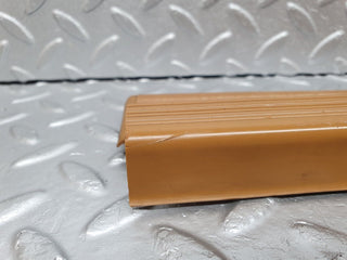W124 front left door sill trim palomino used OEM