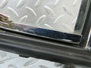 W114 front left quarter window used OEM