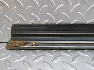 W123 front left door lower moulding trim used OEM