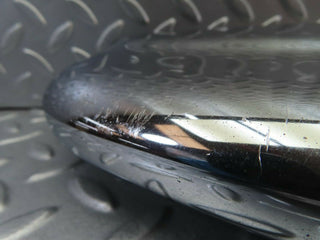 W108 front left upper bumper corner used OEM