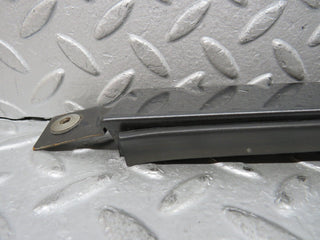 W124 Cabriolet under headlight trim left used OEM